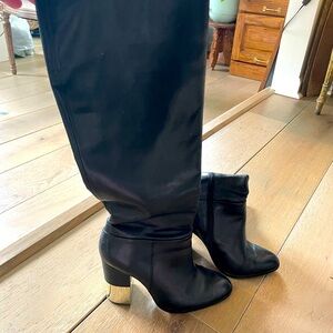 Aldo leather boots with gold heel and zipper side.